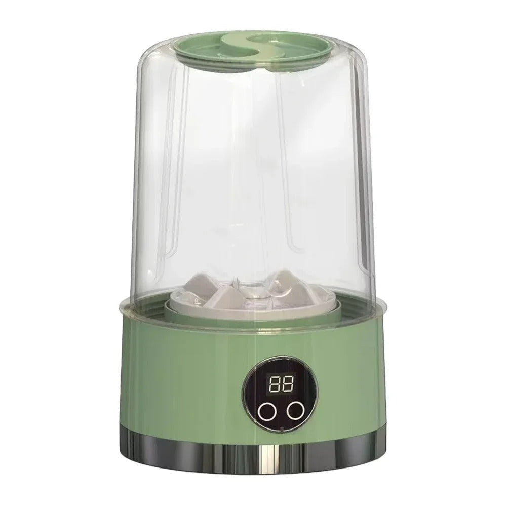 Draagbare mini wasmachine in groen